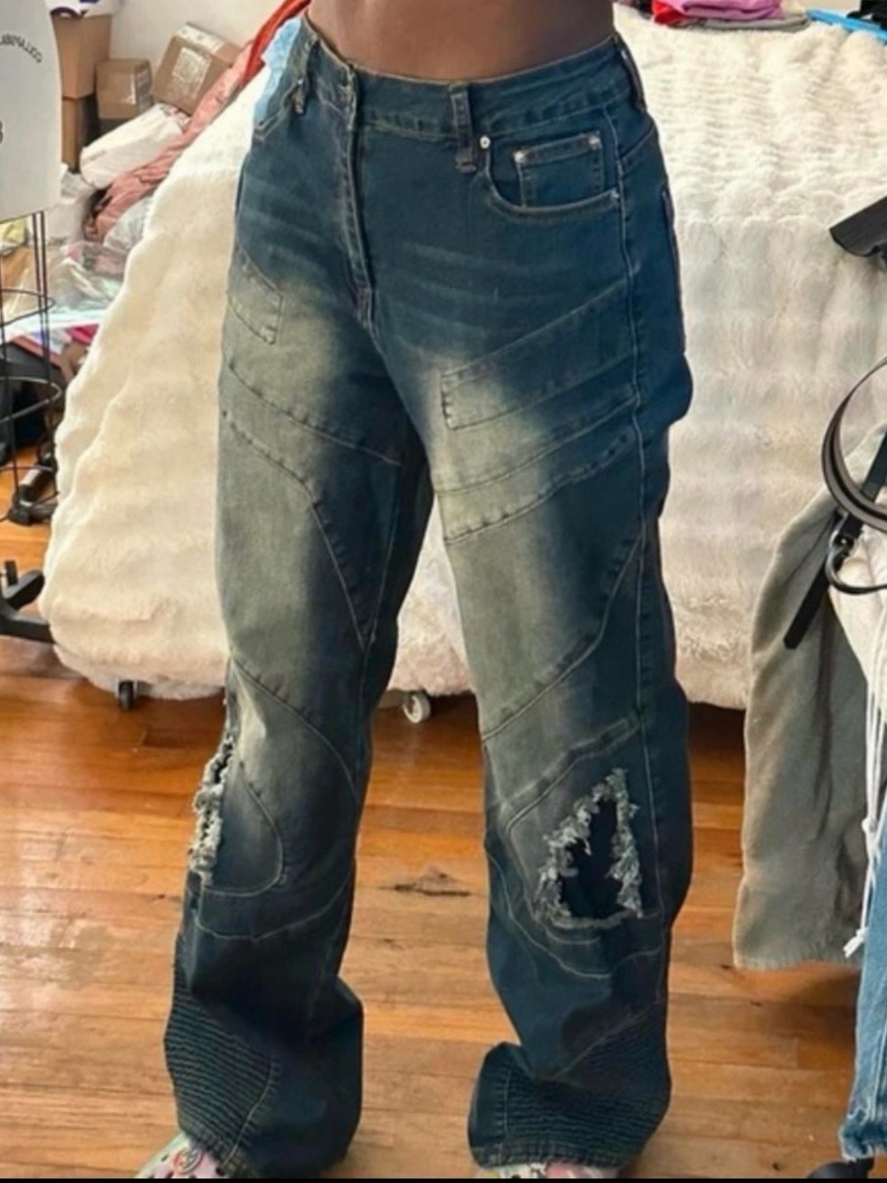 Distressed denim jaded London style jeans with a unique, edgy vibe
